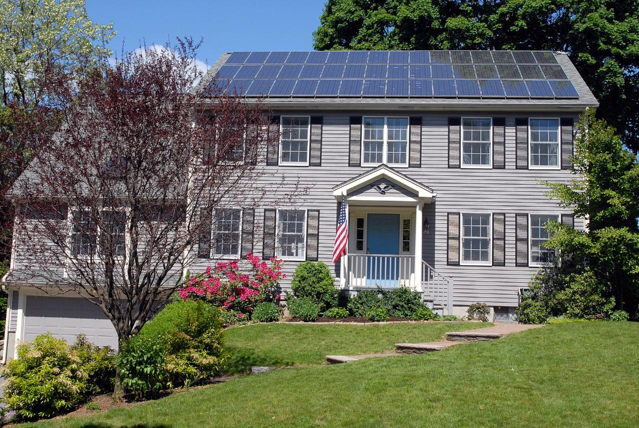 A home with rooftop solar panels, like many in Aurora
